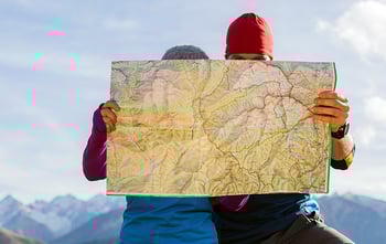 people looking at map
